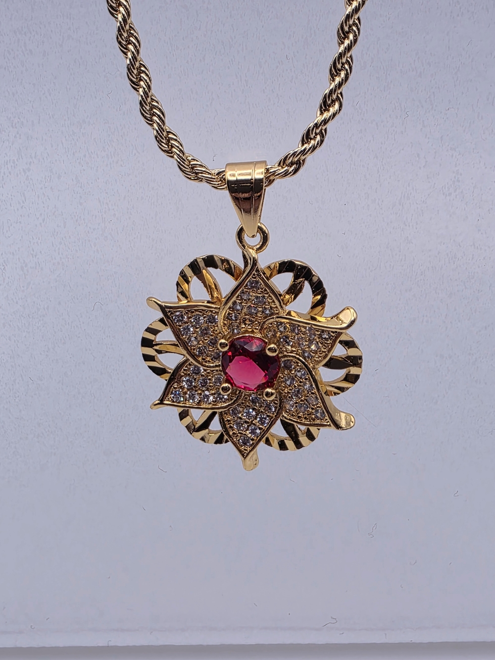 Gold Flower Pendant Necklace with Pink Center Stone - Picture 1 of 4
